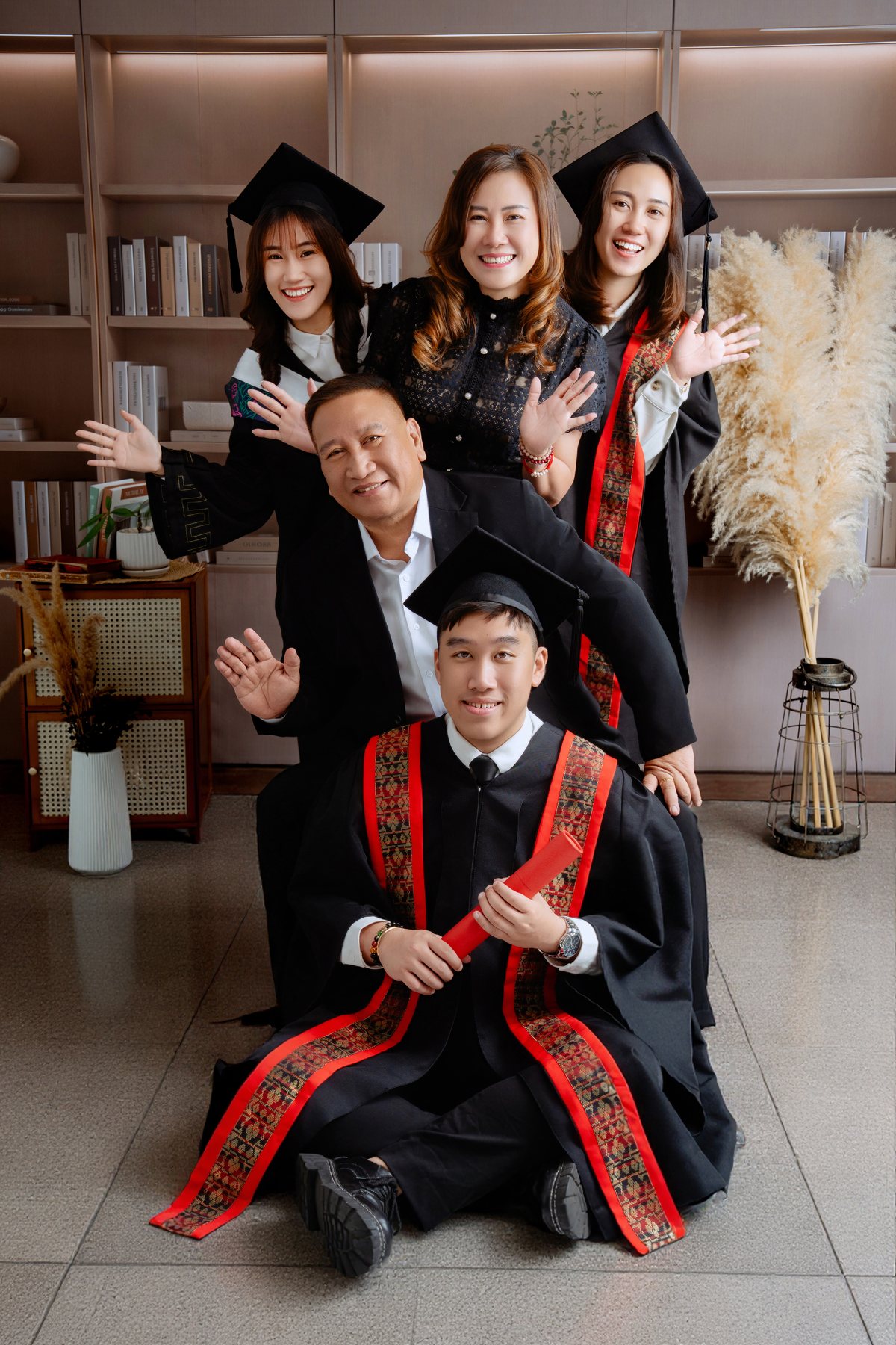 Graduate group portrait with family members