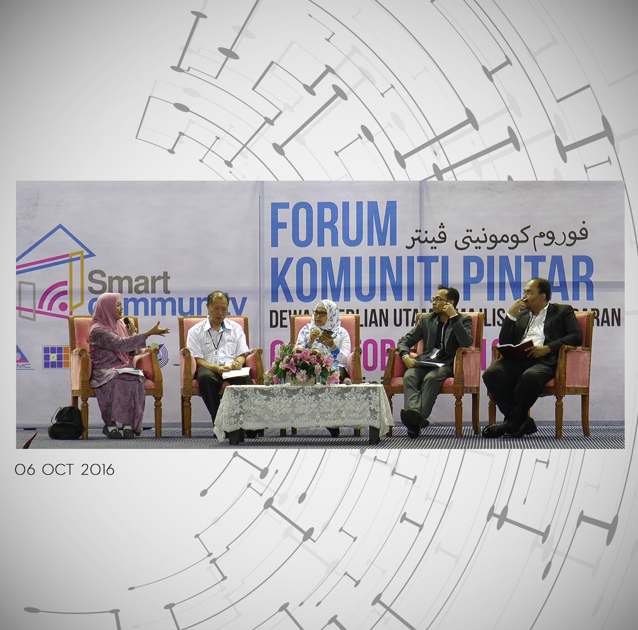 Forum Komuniti Pintar event photography with panel speakers on stage and audience session documentation